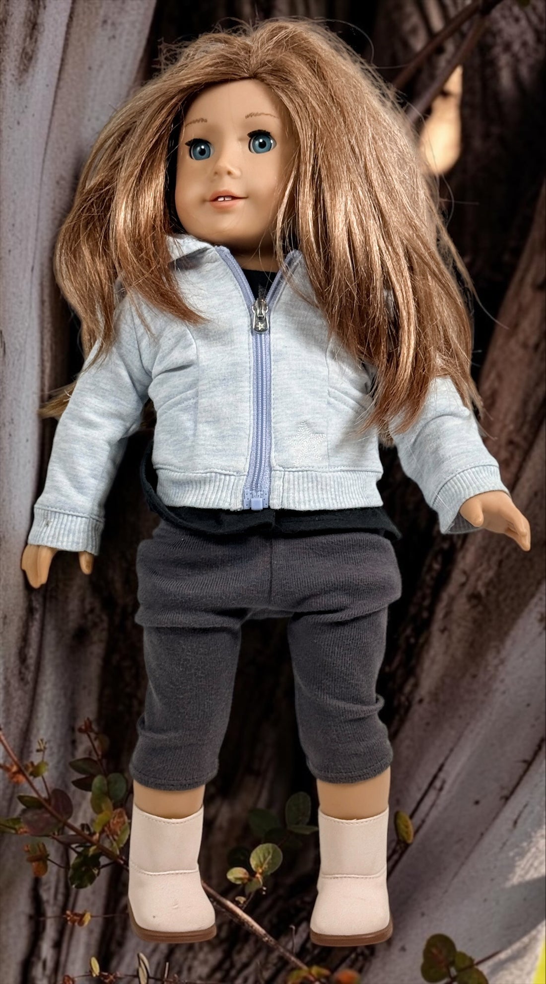 Authentic American Girl 18-inch Truly Me doll with blue eyes, light brown hair, gray hoodie outfit and pink boots. Good pre-owned condition, complete outfit included.