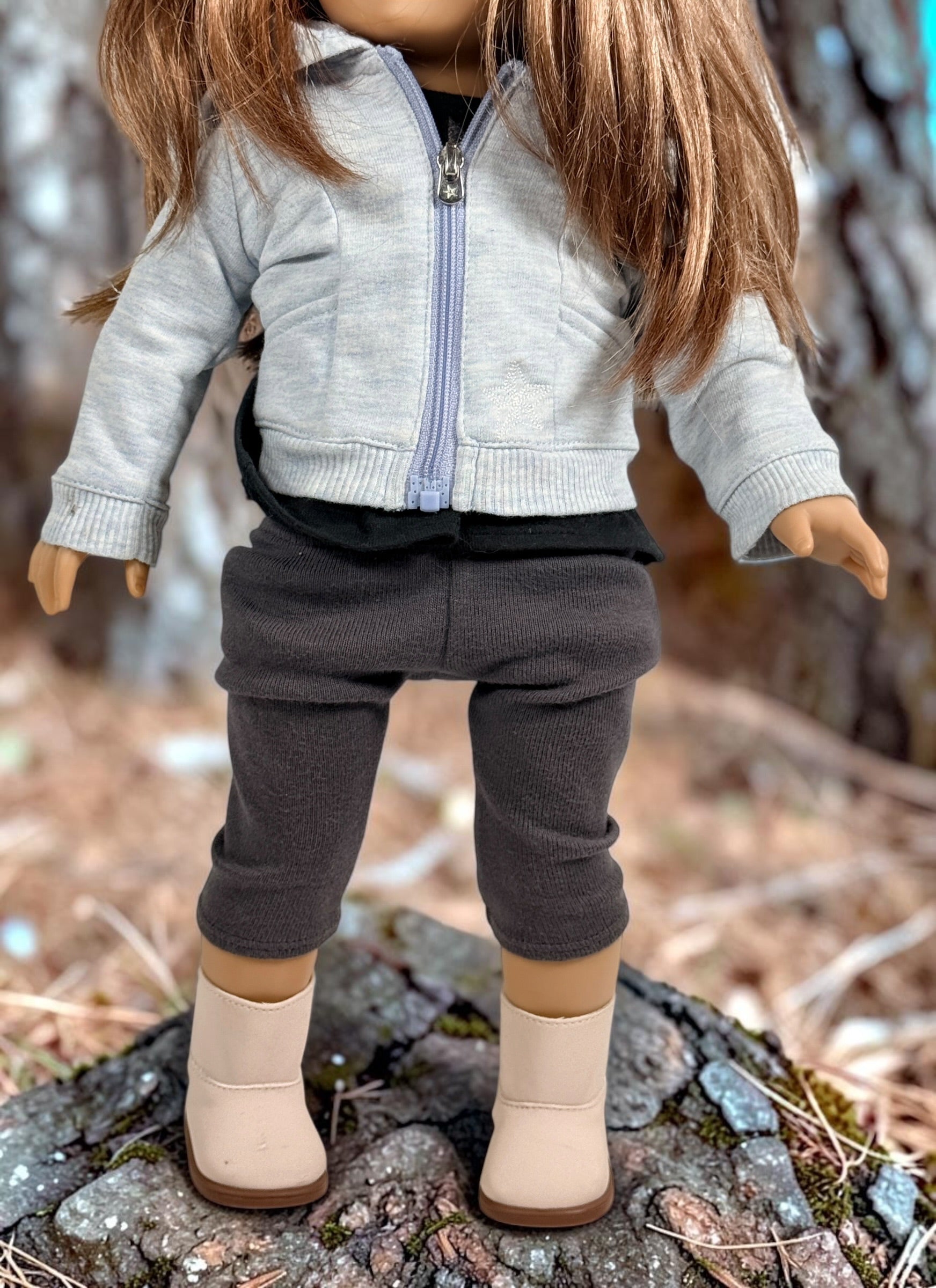 Authentic American Girl 18-inch Truly Me doll with blue eyes, light brown hair, gray hoodie outfit and pink boots. Good pre-owned condition, complete outfit included.