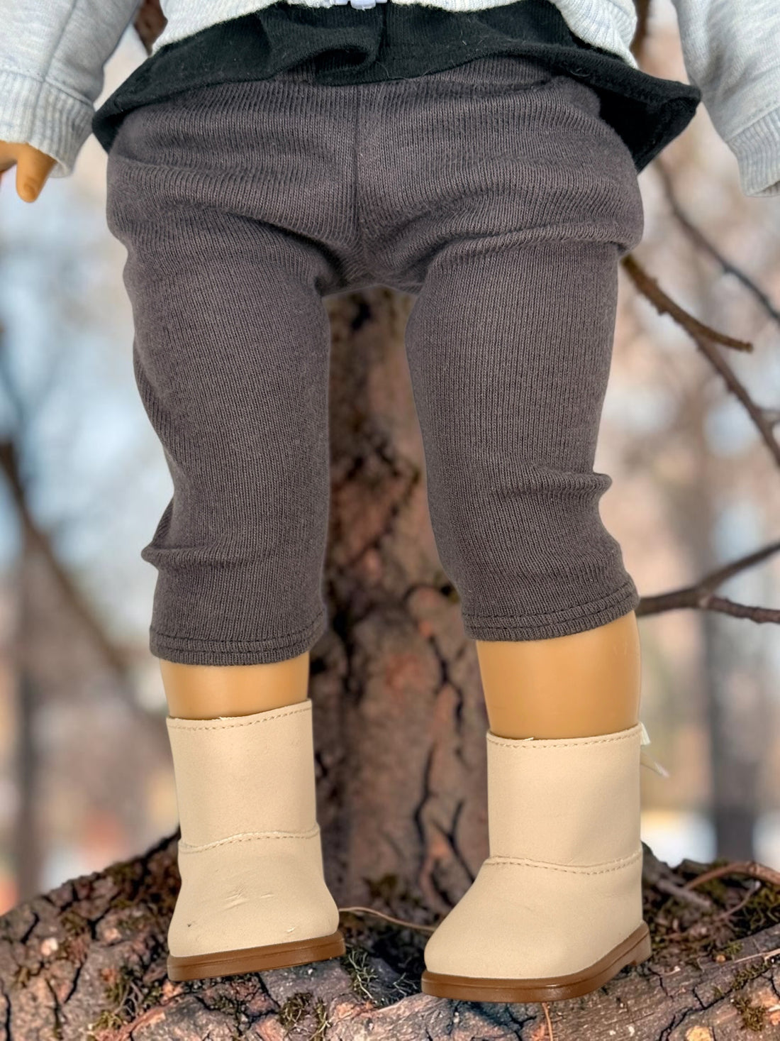 Authentic American Girl 18-inch Truly Me doll with blue eyes, light brown hair, gray hoodie outfit and pink boots. Good pre-owned condition, complete outfit included.
