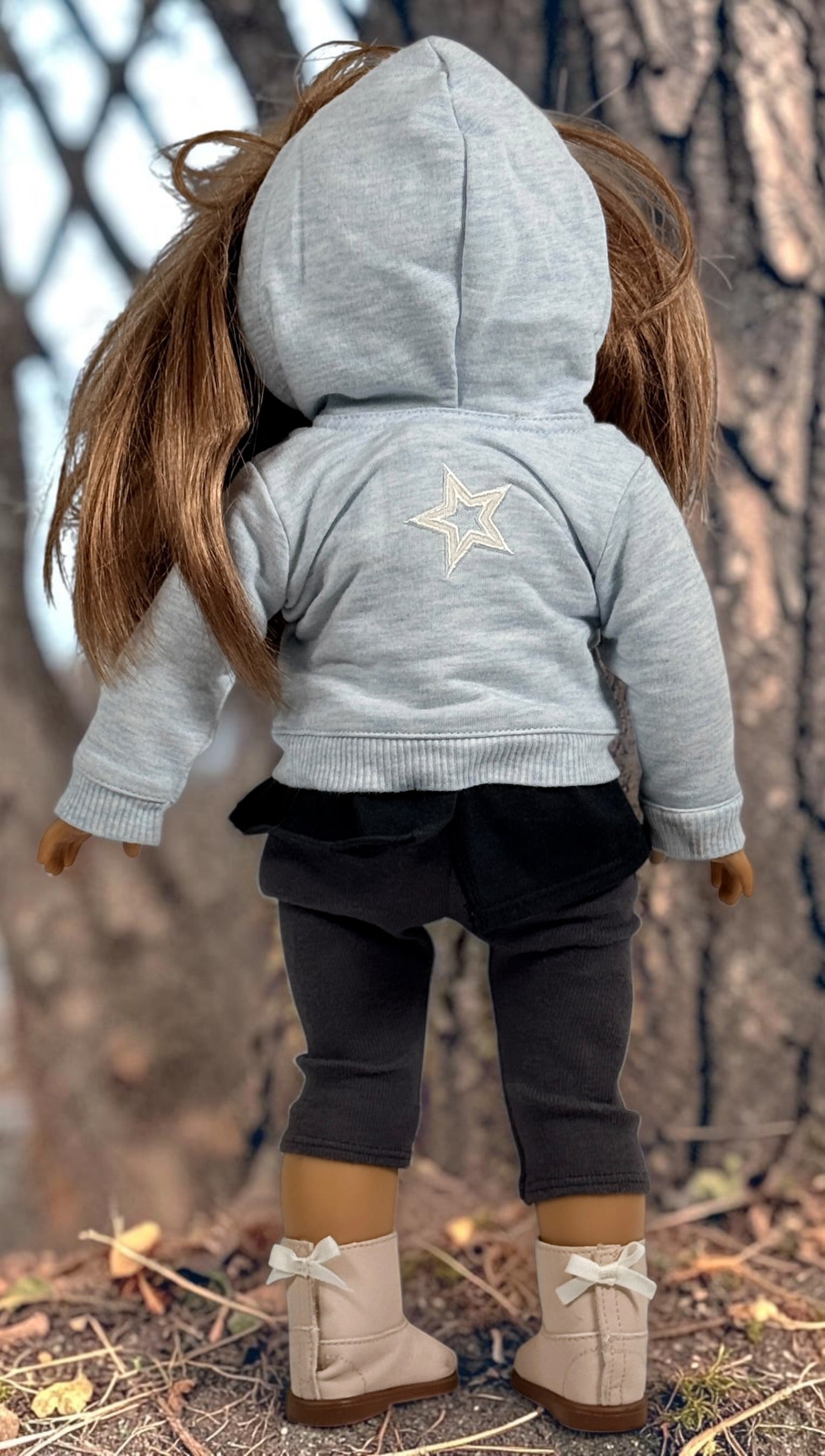 Authentic American Girl 18-inch Truly Me doll with blue eyes, light brown hair, gray hoodie outfit and pink boots. Good pre-owned condition, complete outfit included.