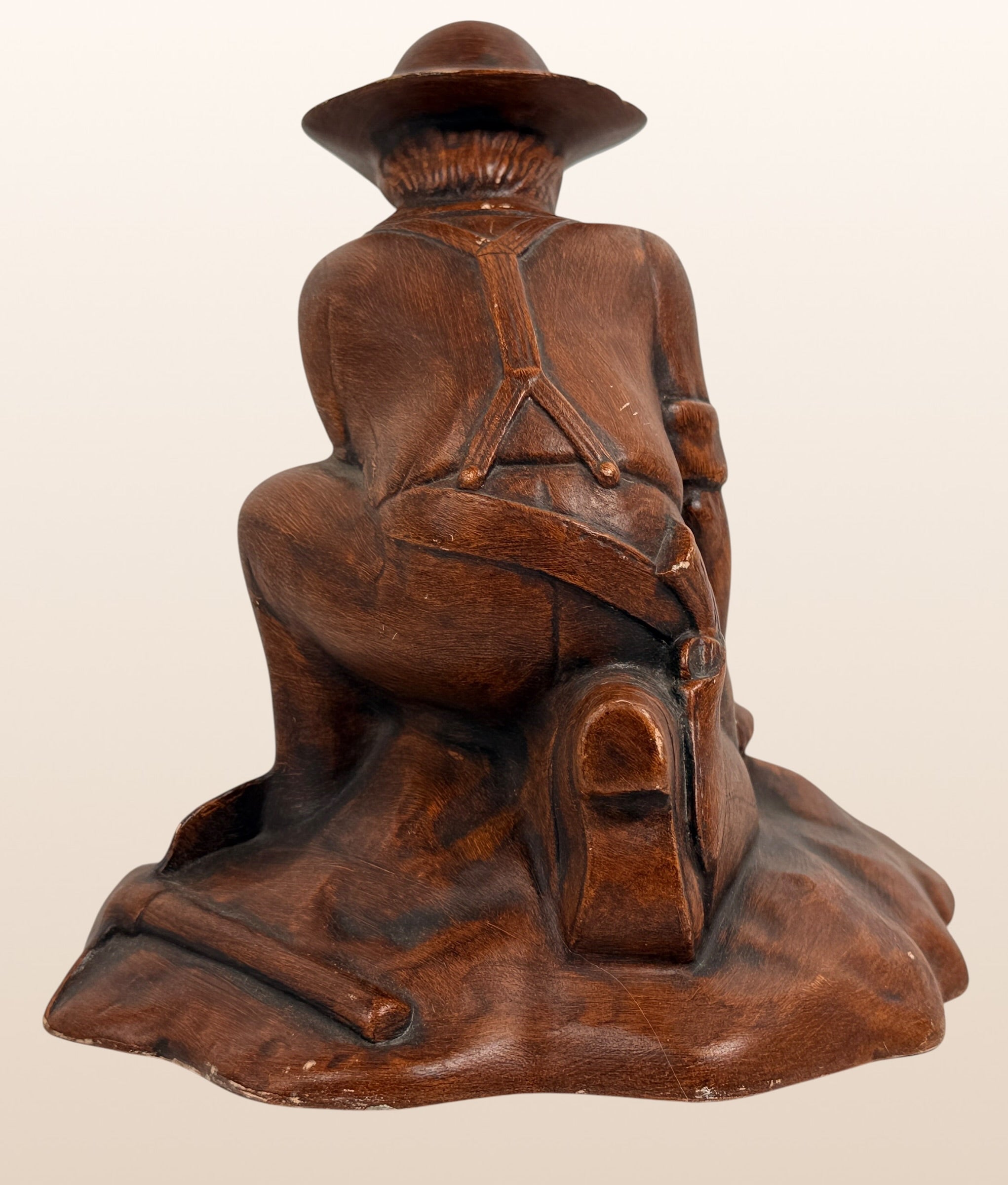 Vintage ceramic Gold Rush prospector ashtray with faux wood finish. Mid-century Western décor collectible, ideal for rustic cabins, Americana, and tobacco memorabilia collectors.