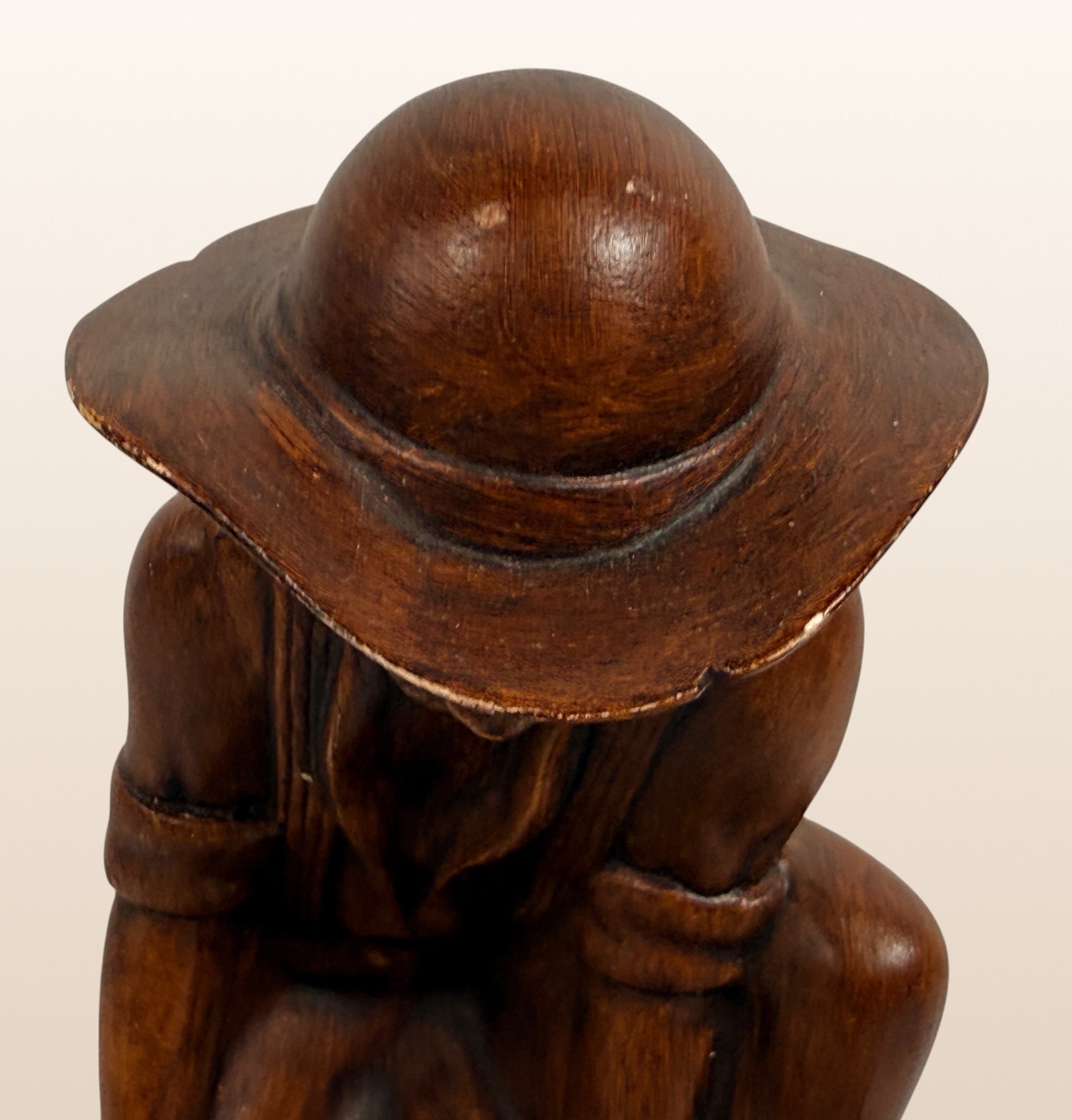 Vintage ceramic Gold Rush prospector ashtray with faux wood finish. Mid-century Western décor collectible, ideal for rustic cabins, Americana, and tobacco memorabilia collectors.