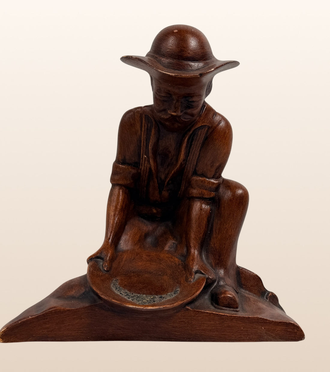 Vintage ceramic Gold Rush prospector ashtray with faux wood finish. Mid-century Western décor collectible, ideal for rustic cabins, Americana, and tobacco memorabilia collectors.
