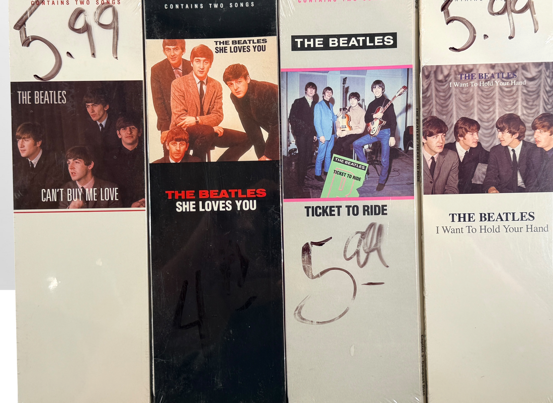 Complete set of eight factory sealed Beatles CD3 Singles in original Capitol longboxes. Rare late-1980s collectible featuring classic hit singles and original packaging.