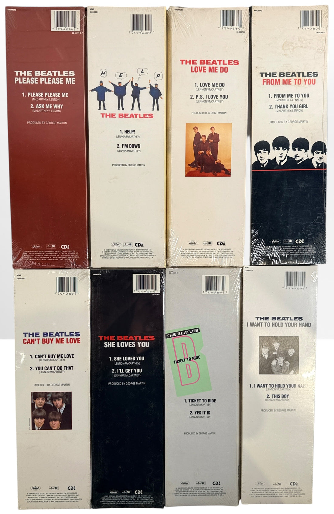 Complete set of eight factory sealed Beatles CD3 Singles in original Capitol longboxes. Rare late-1980s collectible featuring classic hit singles and original packaging.