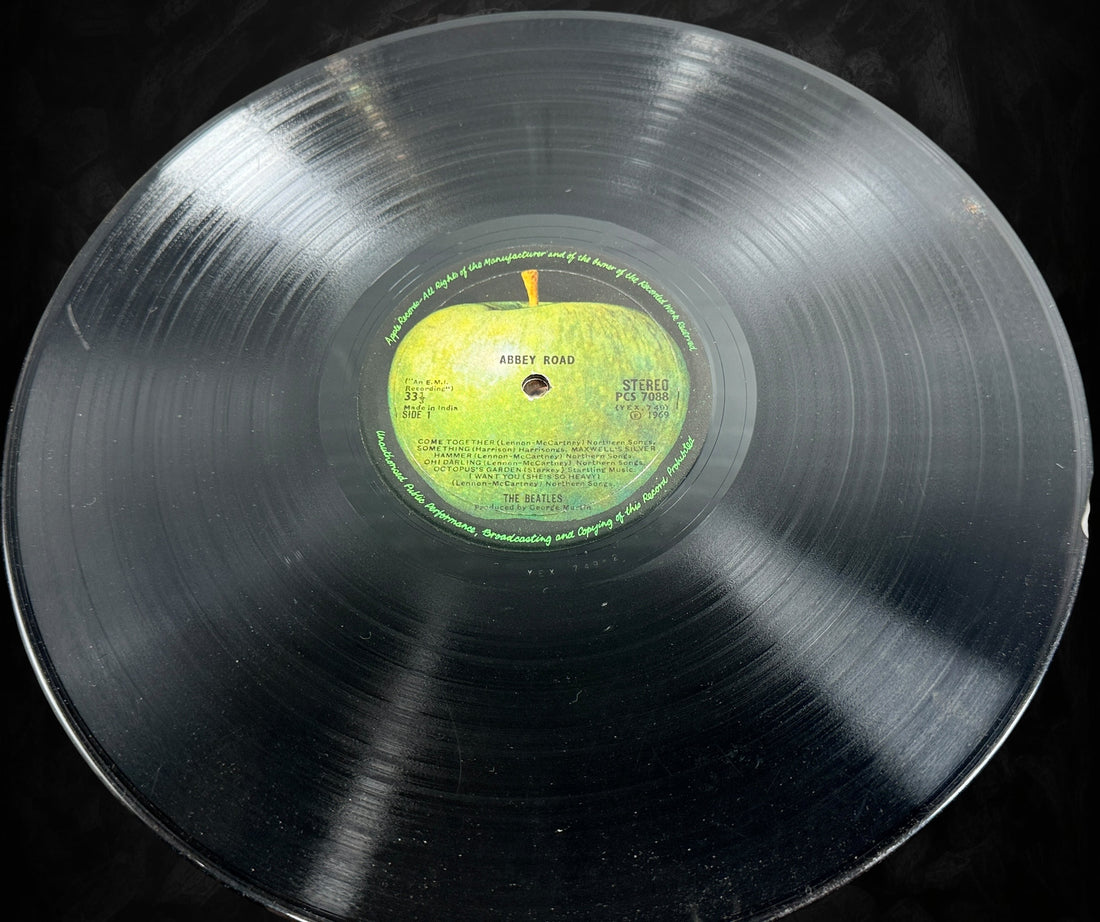 Original Indian pressing of The Beatles Abbey Road on Apple Records PCS 7088. Rare EMI India stereo LP with iconic cover, highly collectible for Beatles fans worldwide.