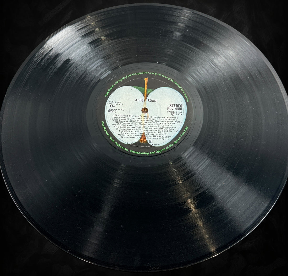 Original Indian pressing of The Beatles Abbey Road on Apple Records PCS 7088. Rare EMI India stereo LP with iconic cover, highly collectible for Beatles fans worldwide.