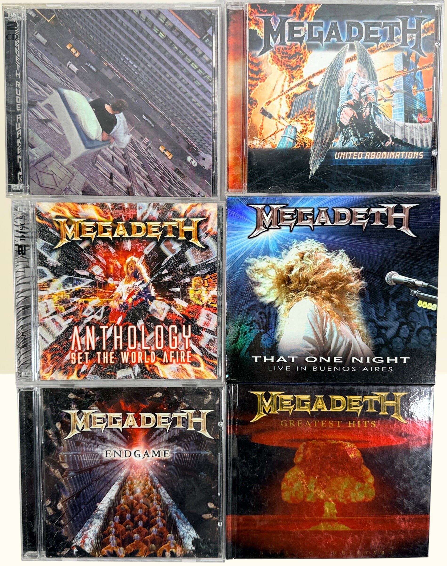 Lot of 6 original Megadeth CDs featuring Endgame, United Abominations, Anthology, Rude Awakening, Greatest Hits and That One Night Live. Complete with original artwork.