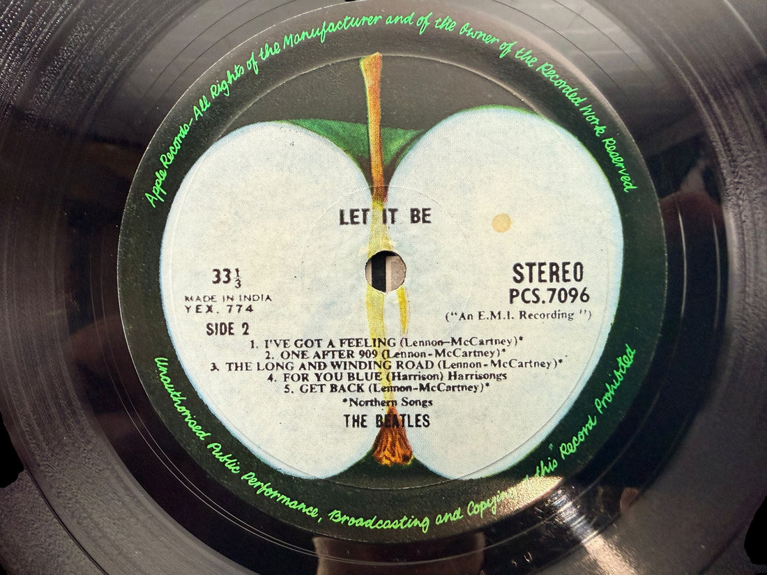Rare Indian pressing of The Beatles Let It Be on Apple Records PCS 7096. Original EMI India vinyl LP with Apple labels, collectible Beatles album in VG+ condition.