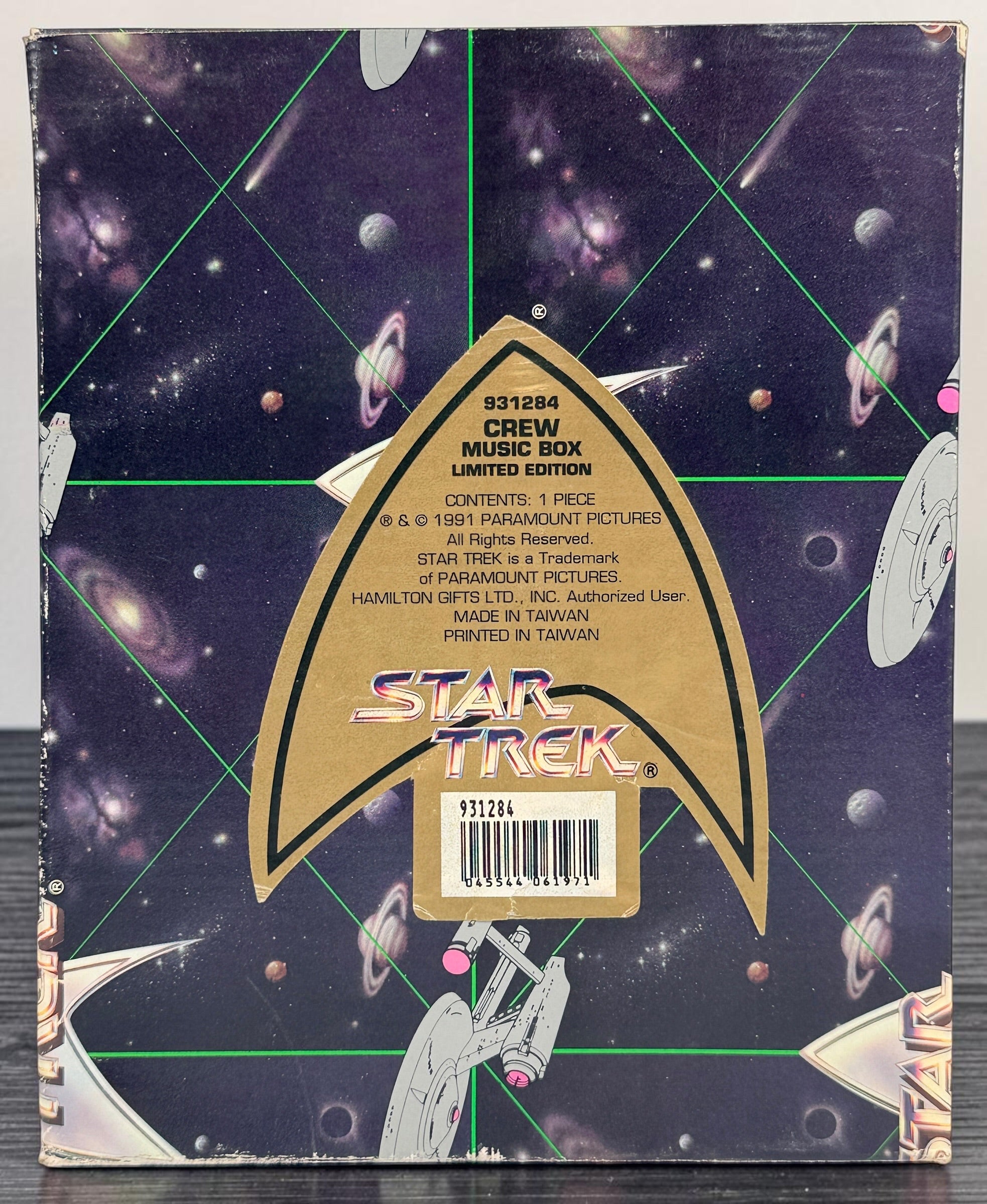 Official 1991 Star Trek Crew Music Box by Hamilton Gifts. Limited edition wind-up collectible featuring Kirk, Spock, McCoy, Scotty, and Uhura with original box.