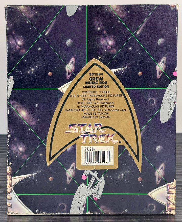 Official 1991 Star Trek Crew Music Box by Hamilton Gifts. Limited edition wind-up collectible featuring Kirk, Spock, McCoy, Scotty, and Uhura with original box.