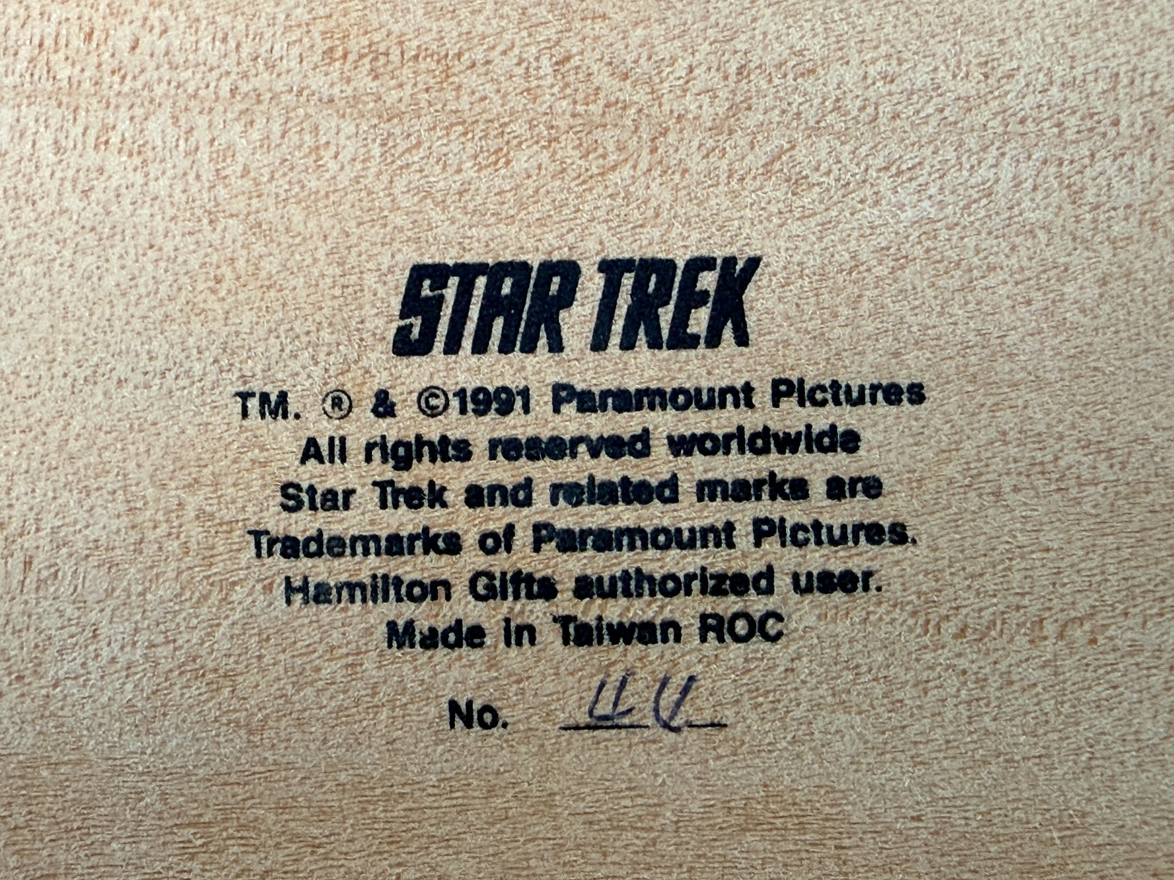Official 1991 Star Trek Crew Music Box by Hamilton Gifts. Limited edition wind-up collectible featuring Kirk, Spock, McCoy, Scotty, and Uhura with original box.