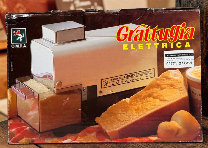 Italian-made OMRA Art. 2900 electric cheese grater with original box. Ideal for Parmesan, Pecorino, breadcrumbs, and other hard foods. Tested and working.