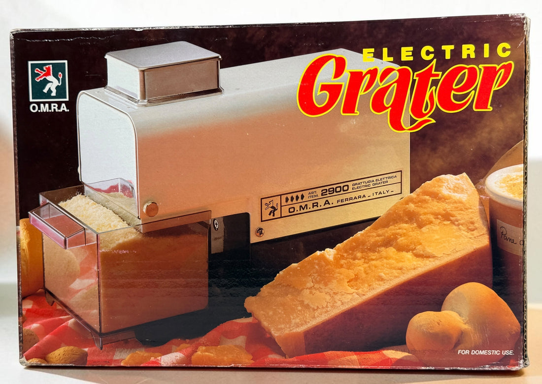 Italian-made OMRA Art. 2900 electric cheese grater with original box. Ideal for Parmesan, Pecorino, breadcrumbs, and other hard foods. Tested and working.