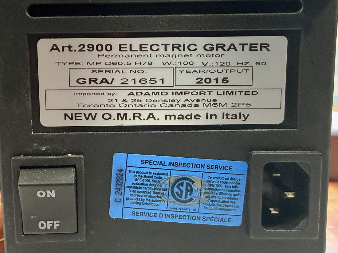 Italian-made OMRA Art. 2900 electric cheese grater with original box. Ideal for Parmesan, Pecorino, breadcrumbs, and other hard foods. Tested and working.