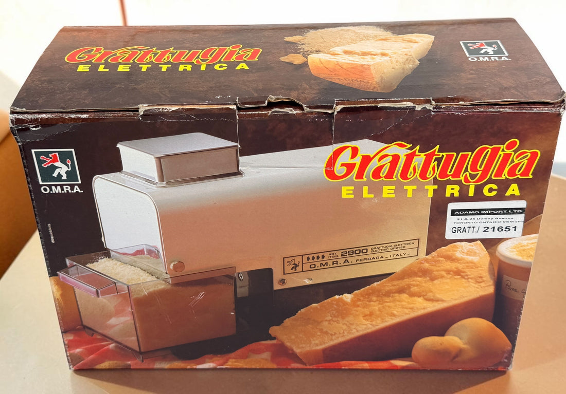 Italian-made OMRA Art. 2900 electric cheese grater with original box. Ideal for Parmesan, Pecorino, breadcrumbs, and other hard foods. Tested and working.