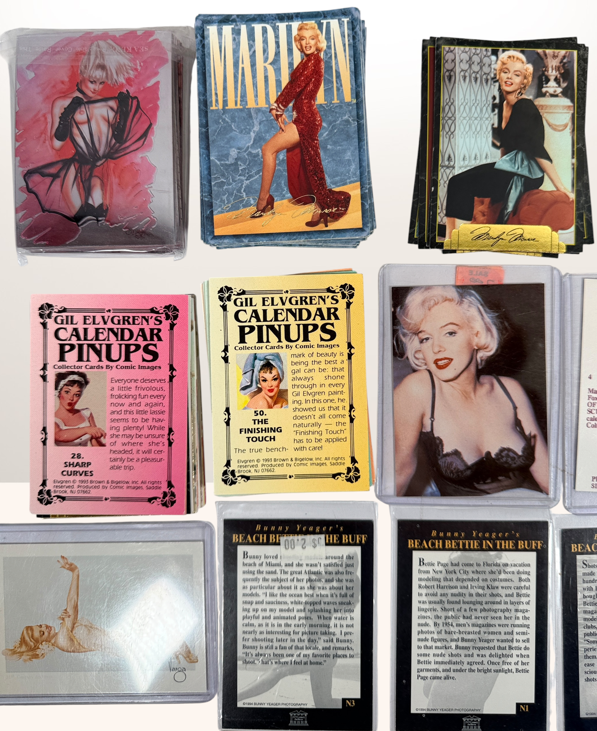 Large lot of 285+ vintage pin-up trading cards featuring Gil Elvgren, Bettie Page, Bunny Yeager, Marilyn Monroe and Comic Images collectible card sets.