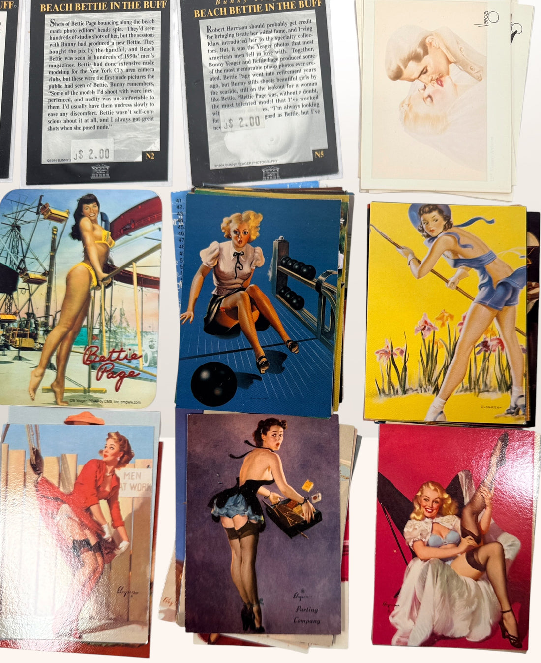 Large lot of 285+ vintage pin-up trading cards featuring Gil Elvgren, Bettie Page, Bunny Yeager, Marilyn Monroe and Comic Images collectible card sets.