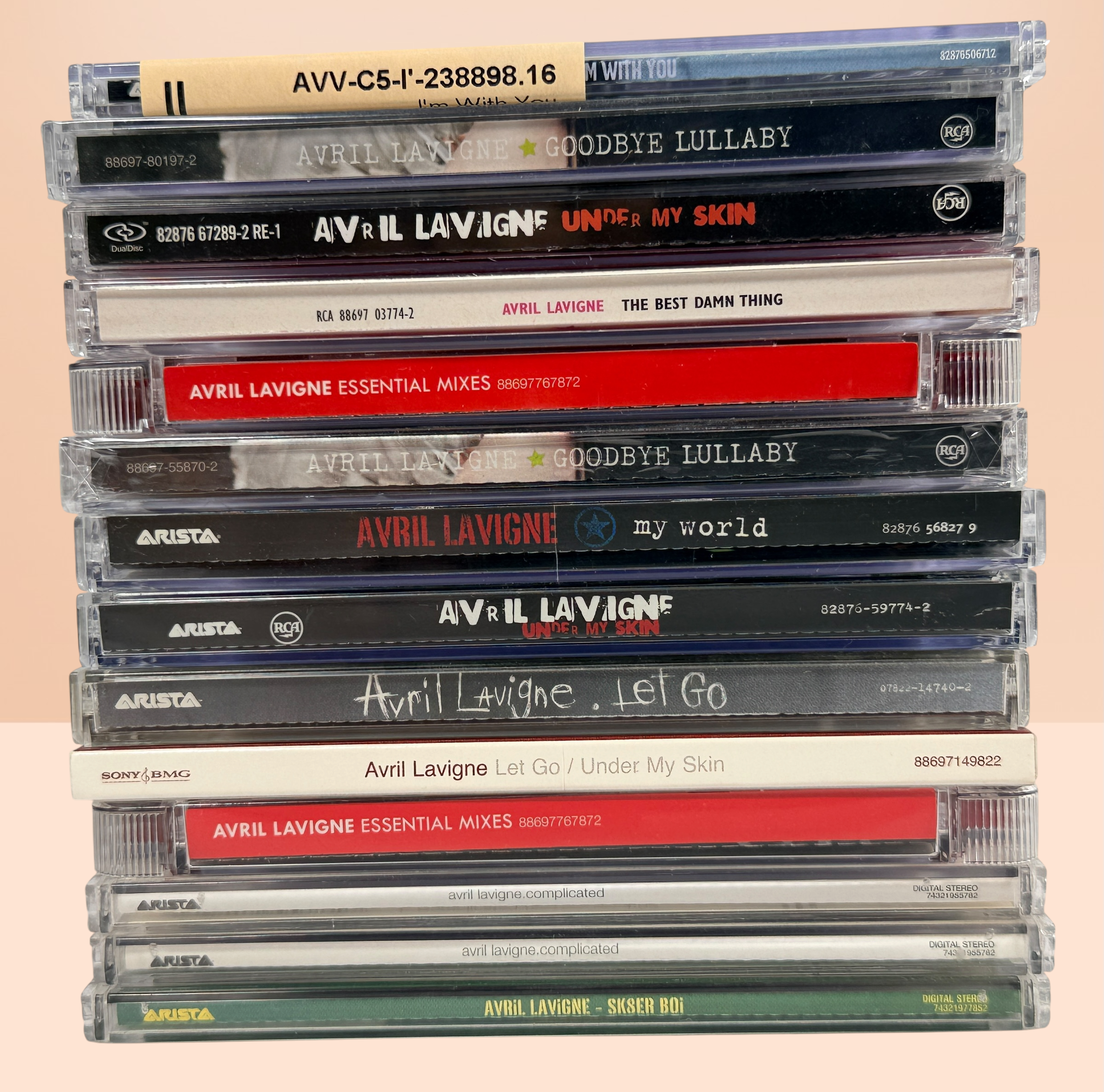 Avril Lavigne CD collection featuring 14 releases including two factory-sealed albums, DualDisc, Essential Mixes, collectible singles, and classic studio albums.