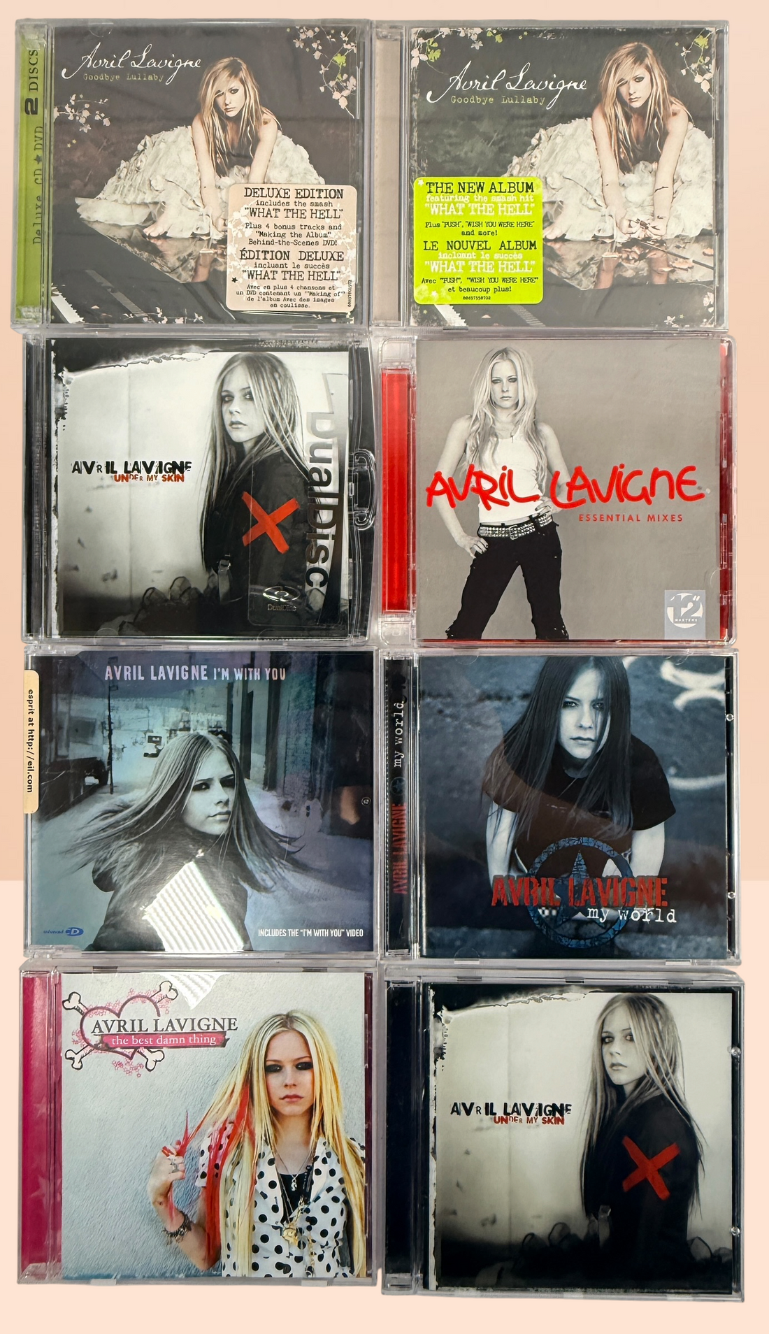 Avril Lavigne CD collection featuring 14 releases including two factory-sealed albums, DualDisc, Essential Mixes, collectible singles, and classic studio albums.