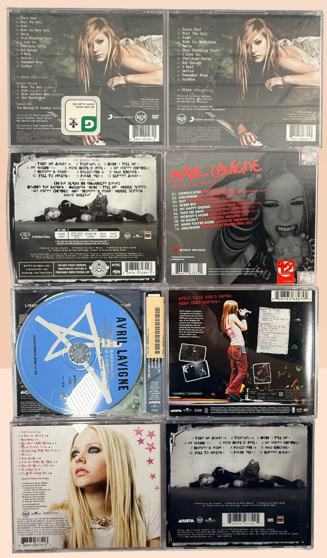 Avril Lavigne CD collection featuring 14 releases including two factory-sealed albums, DualDisc, Essential Mixes, collectible singles, and classic studio albums.