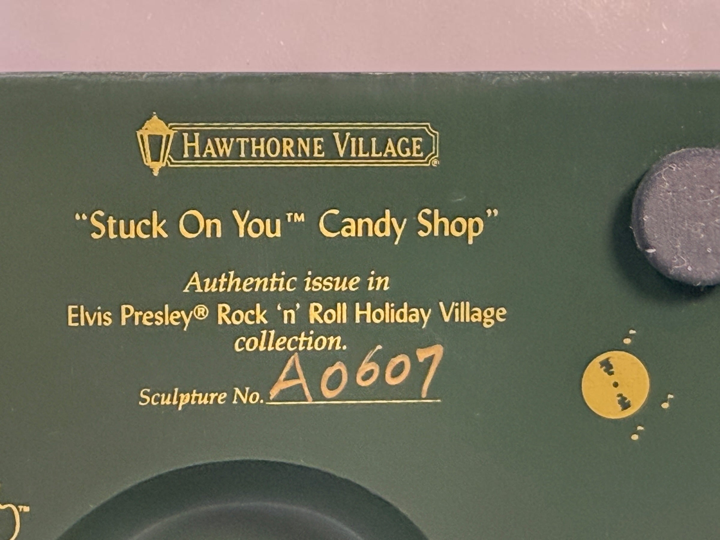 Retired 2006 Hawthorne Village Elvis Presley Stuck On You Candy Shop from the Rock ‘n’ Roll Holiday Village collection. Light cord not included.
