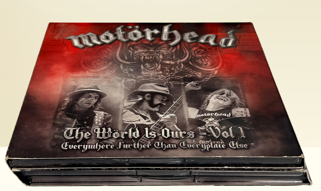 Complete Motörhead The World Is Ours Vol. 1 deluxe 3-disc live set with DVD and 2 audio CDs. Features Lemmy, Ace of Spades, Overkill, and bonus interviews.