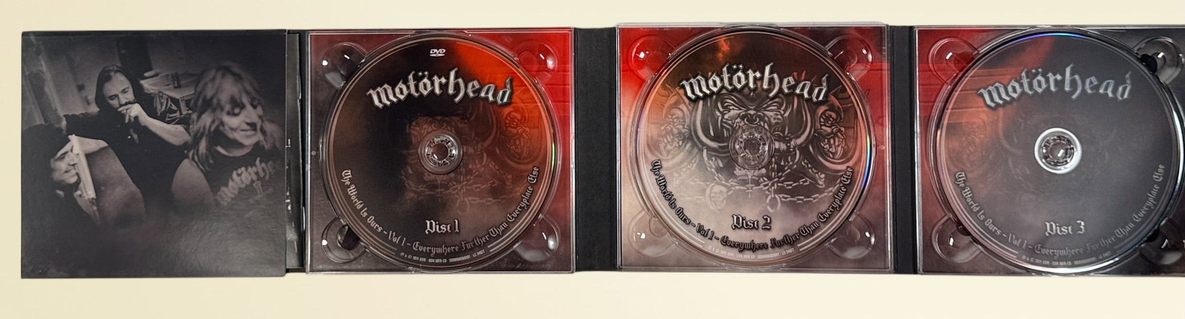 Complete Motörhead The World Is Ours Vol. 1 deluxe 3-disc live set with DVD and 2 audio CDs. Features Lemmy, Ace of Spades, Overkill, and bonus interviews.