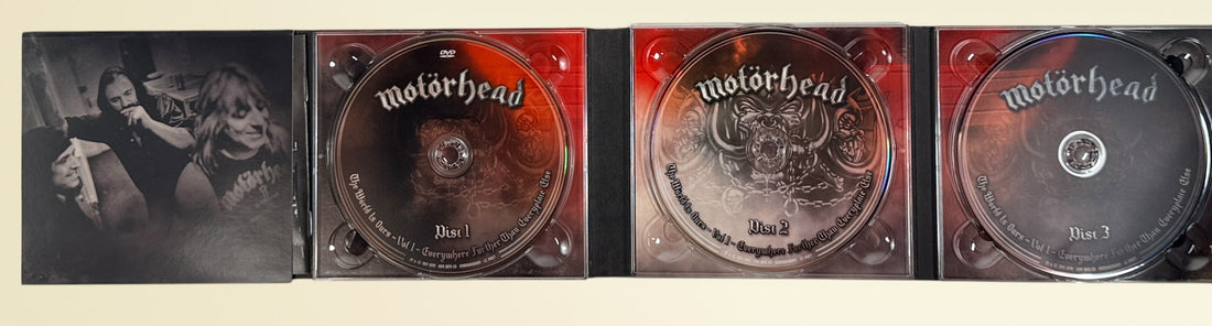 Complete Motörhead The World Is Ours Vol. 1 deluxe 3-disc live set with DVD and 2 audio CDs. Features Lemmy, Ace of Spades, Overkill, and bonus interviews.