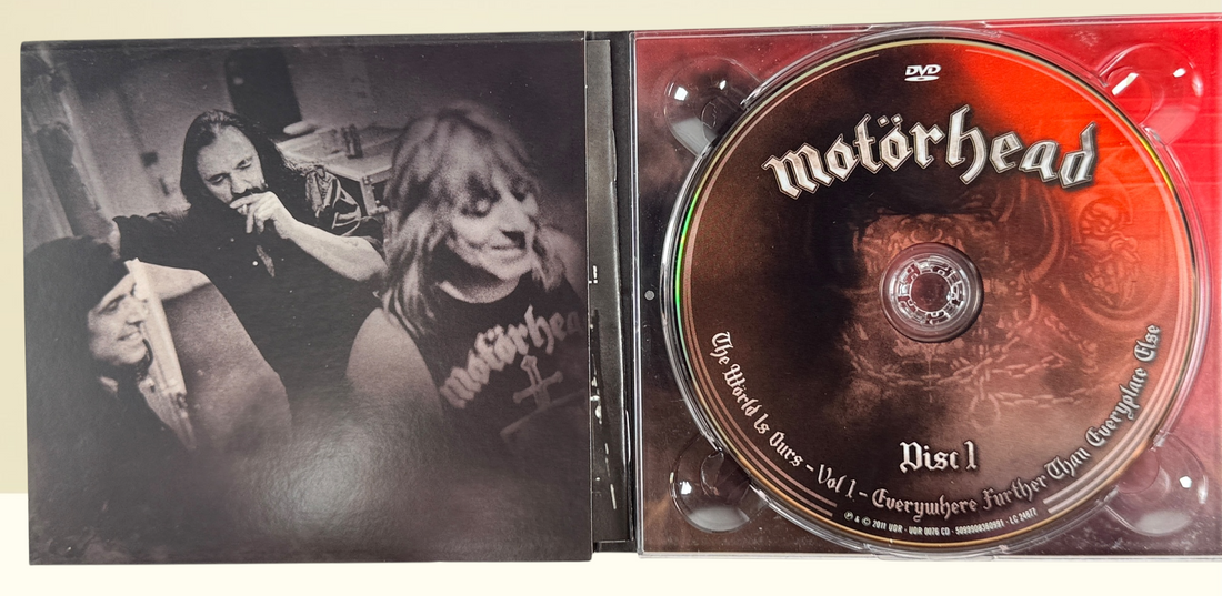 Complete Motörhead The World Is Ours Vol. 1 deluxe 3-disc live set with DVD and 2 audio CDs. Features Lemmy, Ace of Spades, Overkill, and bonus interviews.