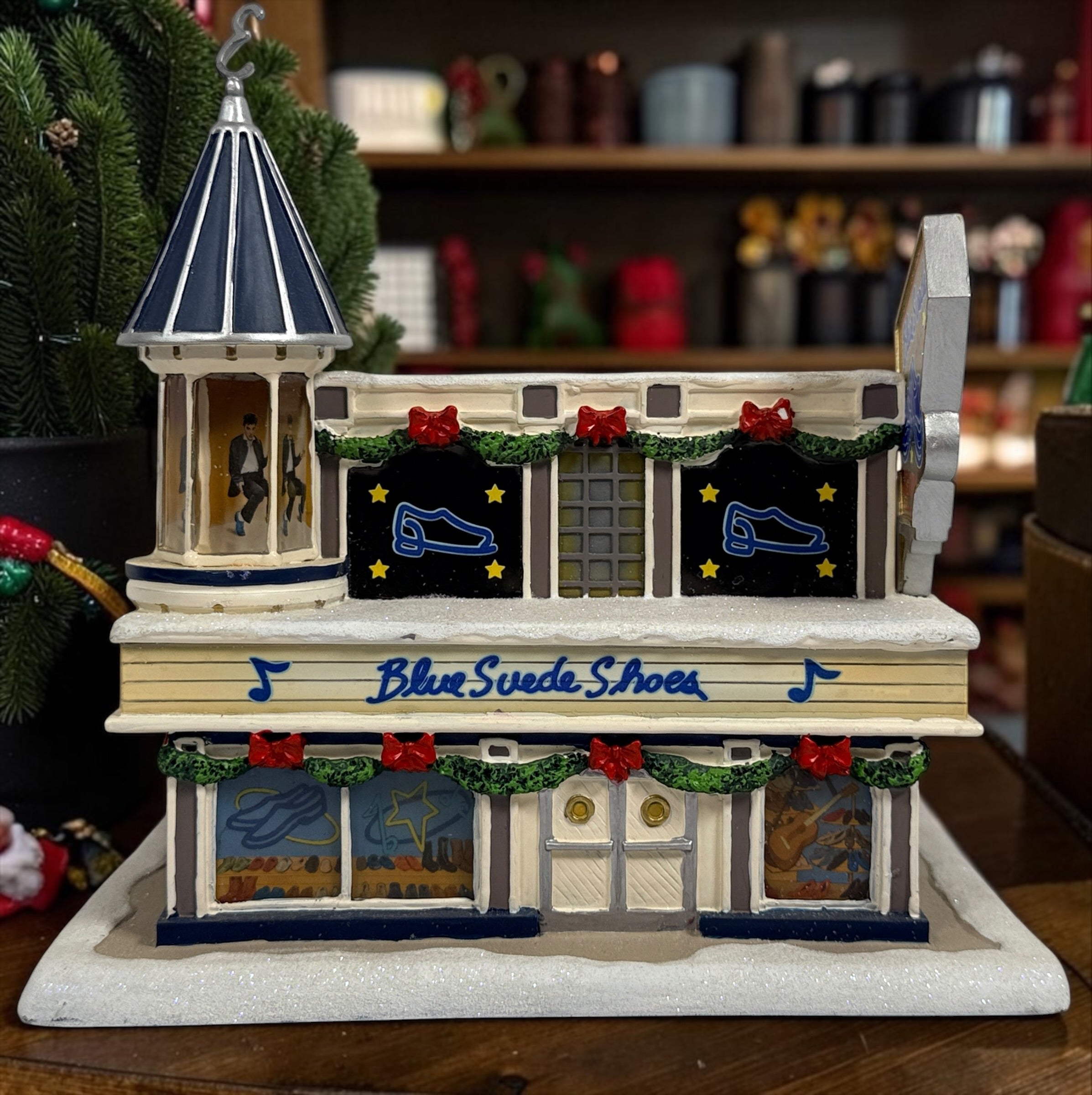 Retired 2004 Hawthorne Village Elvis Presley Blue Suede Shoes Store from the Rock ‘n’ Roll Holiday Village collection. Great collectible display piece.