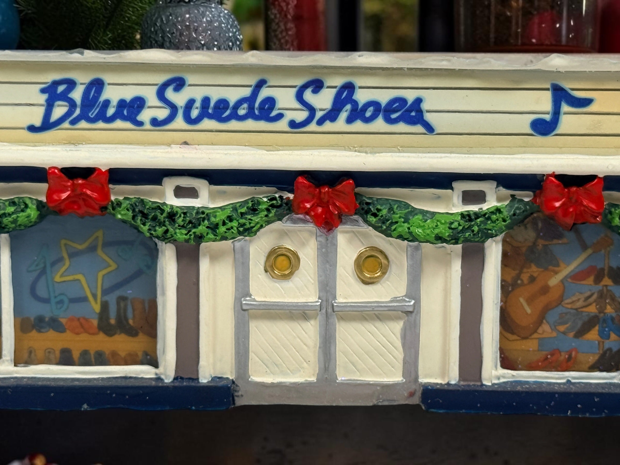 Retired 2004 Hawthorne Village Elvis Presley Blue Suede Shoes Store from the Rock ‘n’ Roll Holiday Village collection. Great collectible display piece.