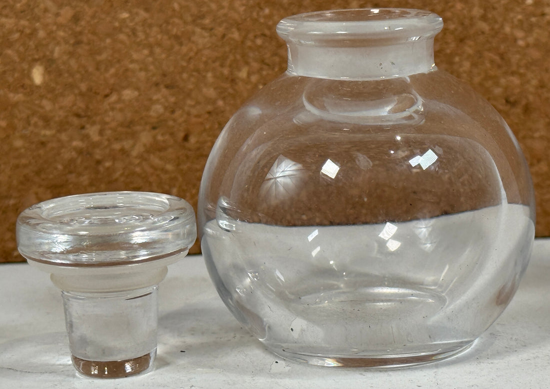 Hand-signed Lalique France crystal perfume bottle with stopper. Clear lead crystal, elegant minimal design, excellent condition. Ships worldwide from Montreal.