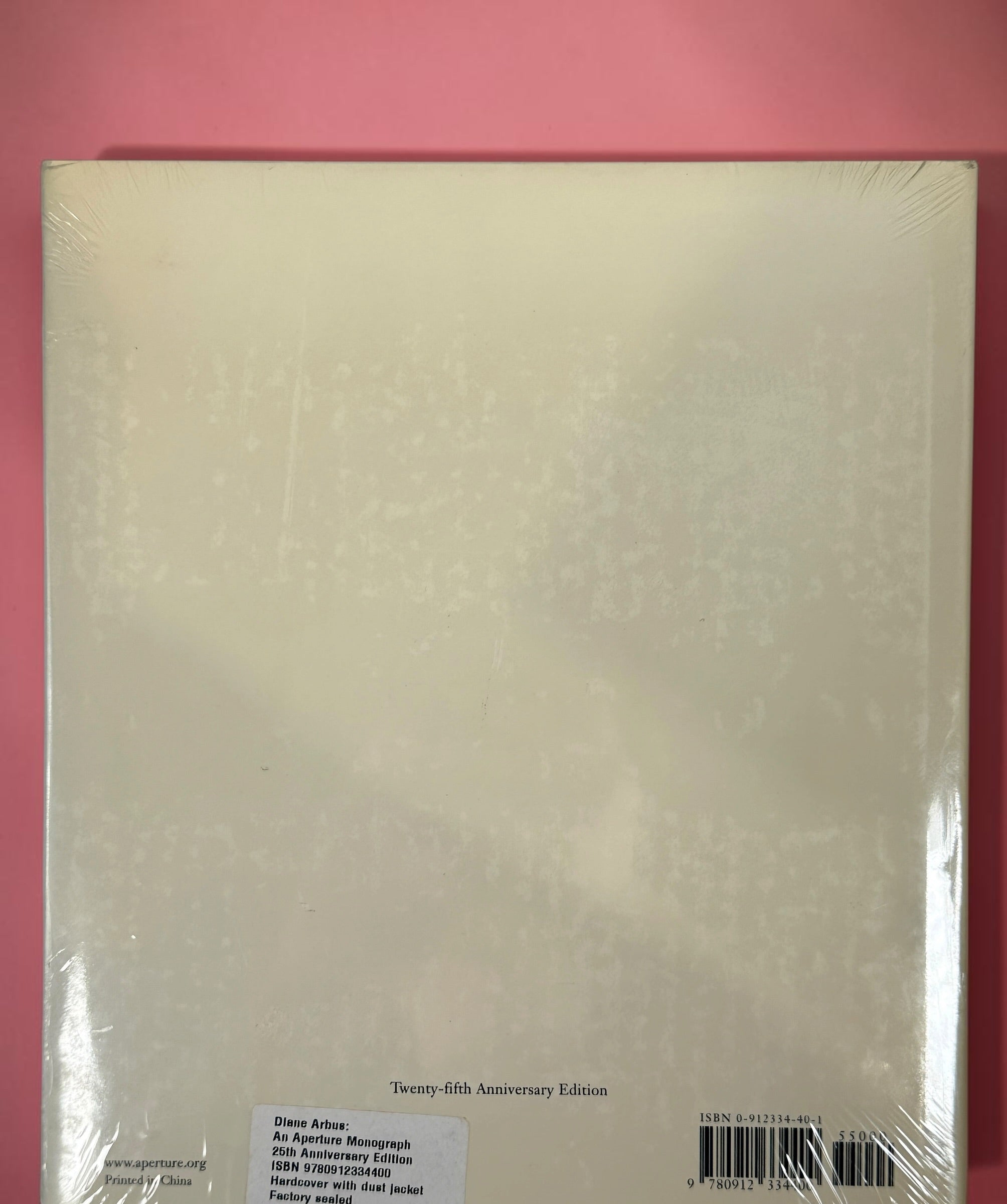 Factory sealed Diane Arbus An Aperture Monograph 25th Anniversary Edition hardcover by Aperture. Classic fine art photography book with original dust jacket and shrink wrap.