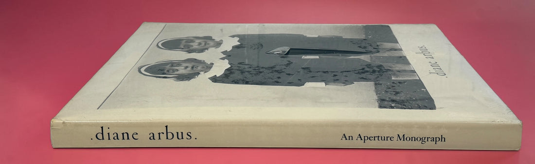 Factory sealed Diane Arbus An Aperture Monograph 25th Anniversary Edition hardcover by Aperture. Classic fine art photography book with original dust jacket and shrink wrap.