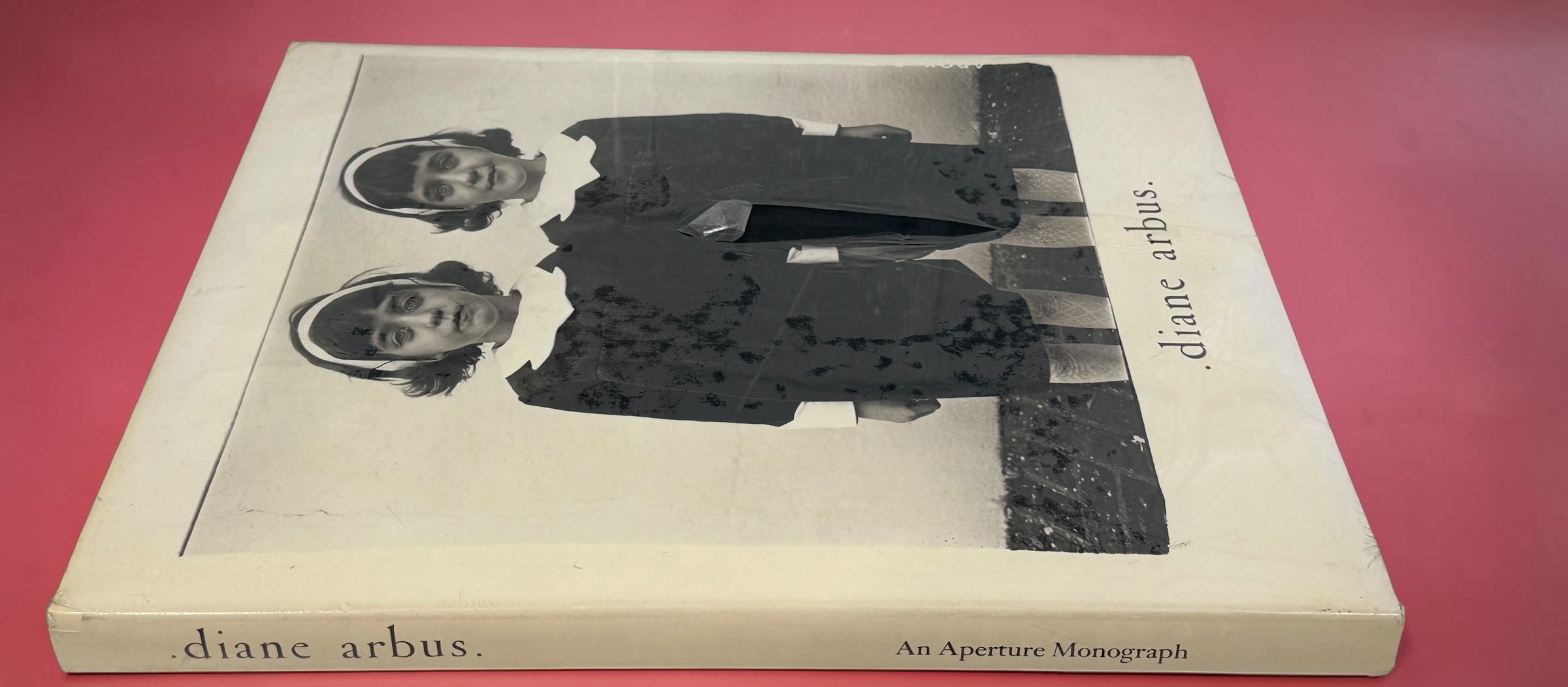 Factory sealed Diane Arbus An Aperture Monograph 25th Anniversary Edition hardcover by Aperture. Classic fine art photography book with original dust jacket and shrink wrap.