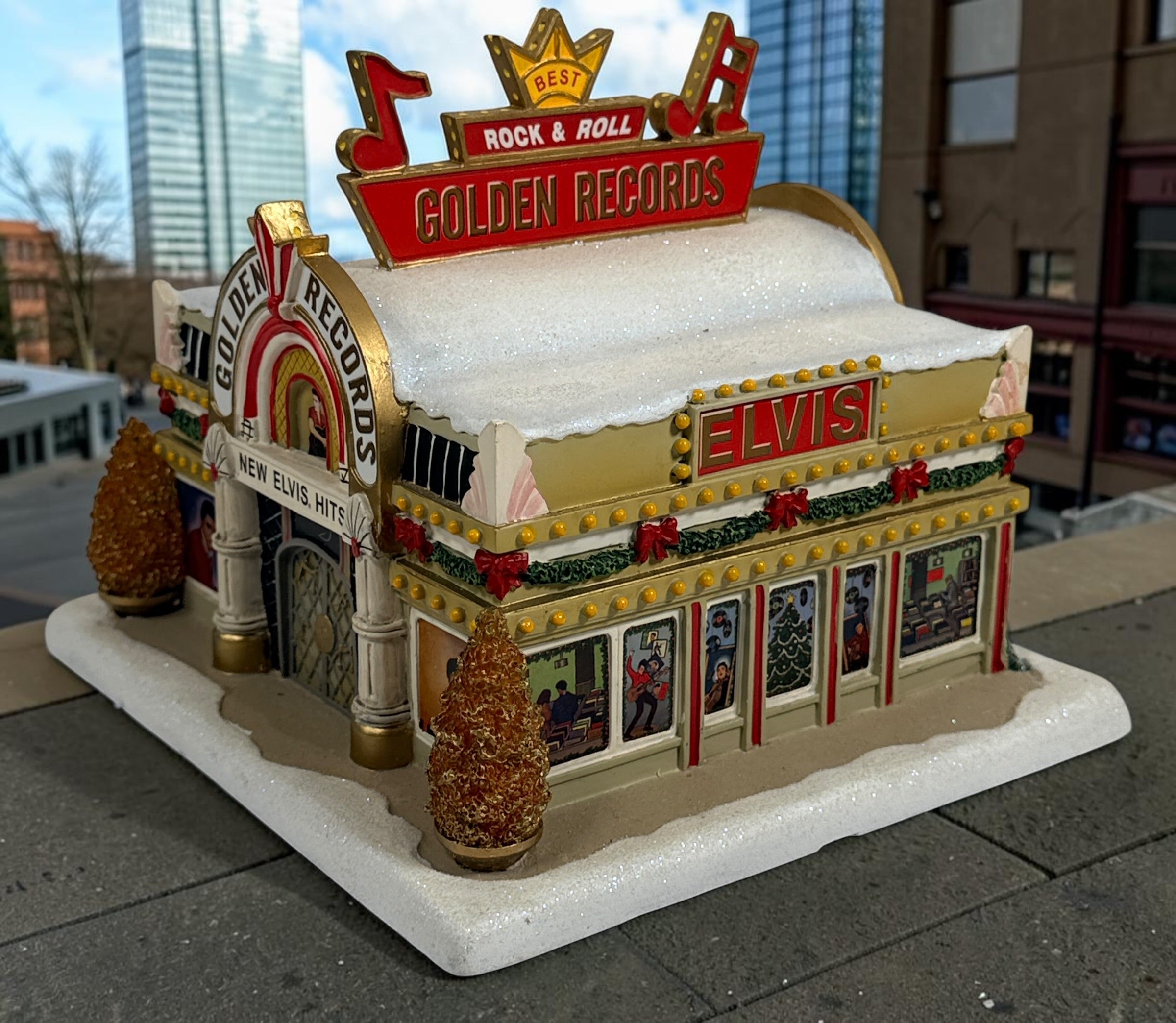 Retired 2004 Hawthorne Village Elvis Presley Golden Records Store from the Rock ‘n’ Roll Holiday Village collection. Light cord not included.