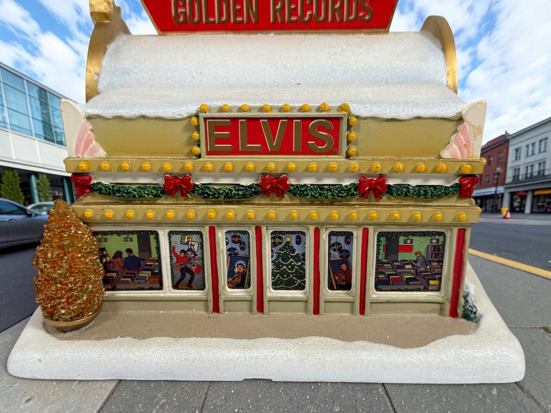 Retired 2004 Hawthorne Village Elvis Presley Golden Records Store from the Rock ‘n’ Roll Holiday Village collection. Light cord not included.