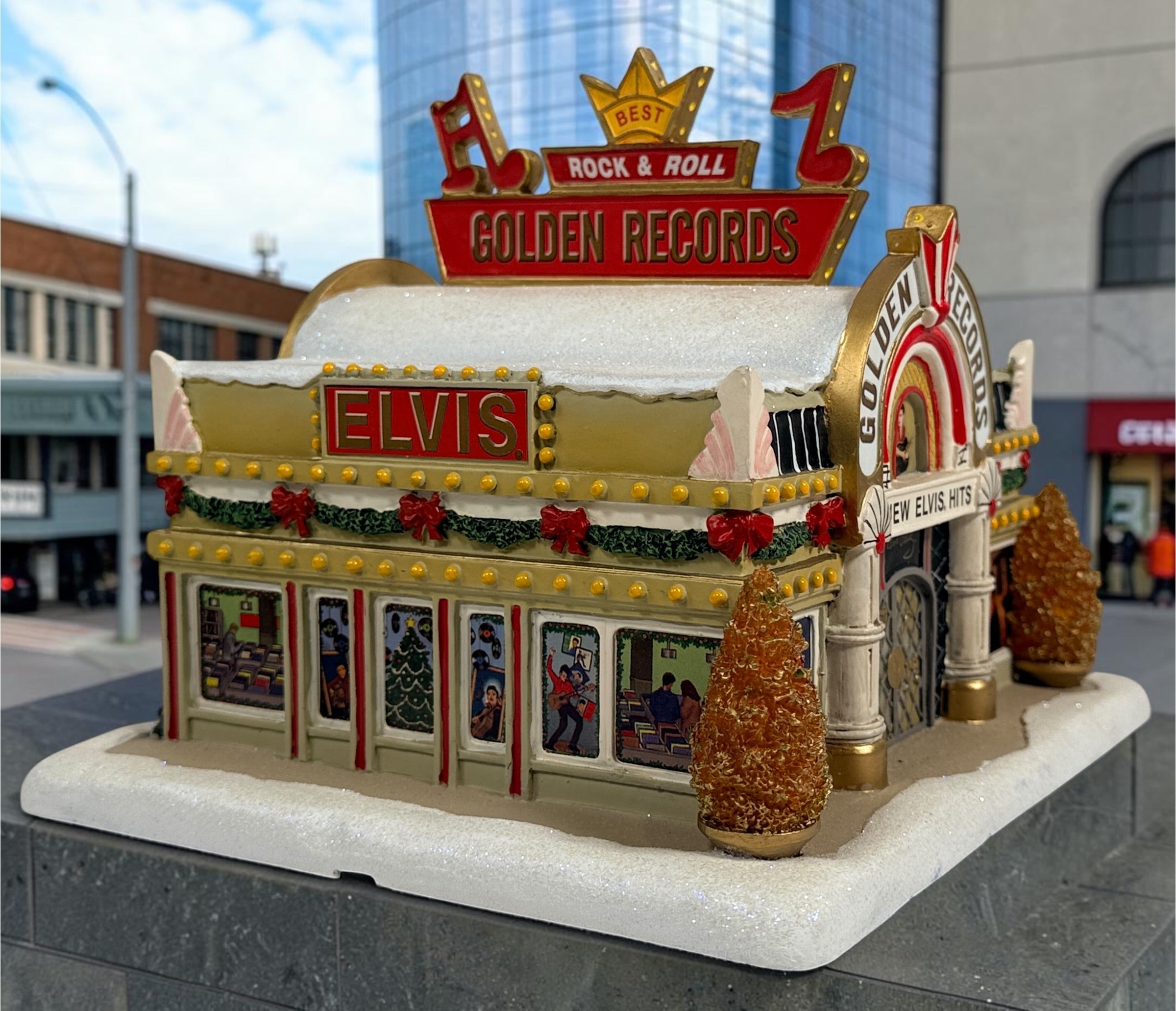 Retired 2004 Hawthorne Village Elvis Presley Golden Records Store from the Rock ‘n’ Roll Holiday Village collection. Light cord not included.
