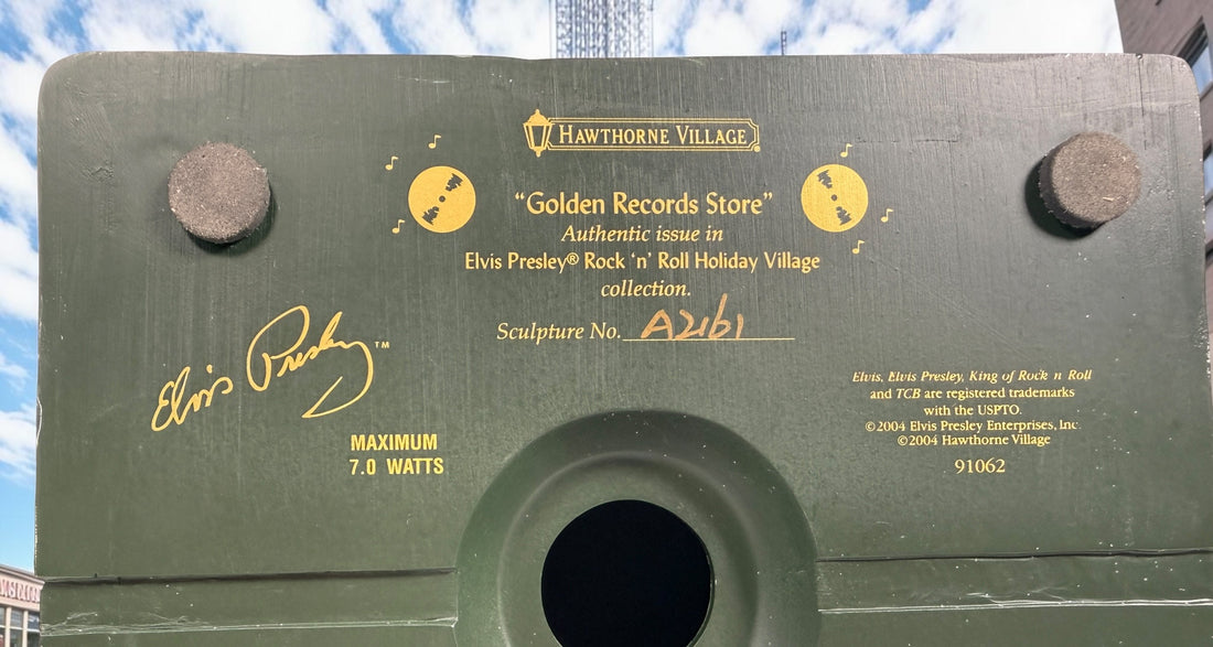 Retired 2004 Hawthorne Village Elvis Presley Golden Records Store from the Rock ‘n’ Roll Holiday Village collection. Light cord not included.