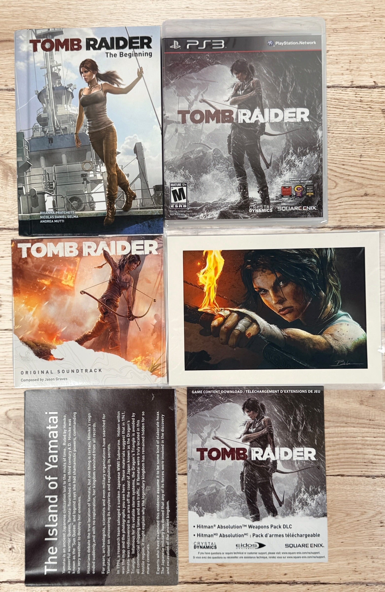 Complete Tomb Raider PS3 Collector’s Edition Survival Kit with Lara Croft figure, soundtrack CD, comic, map, sealed badges, lithograph and original metal collector’s tin.