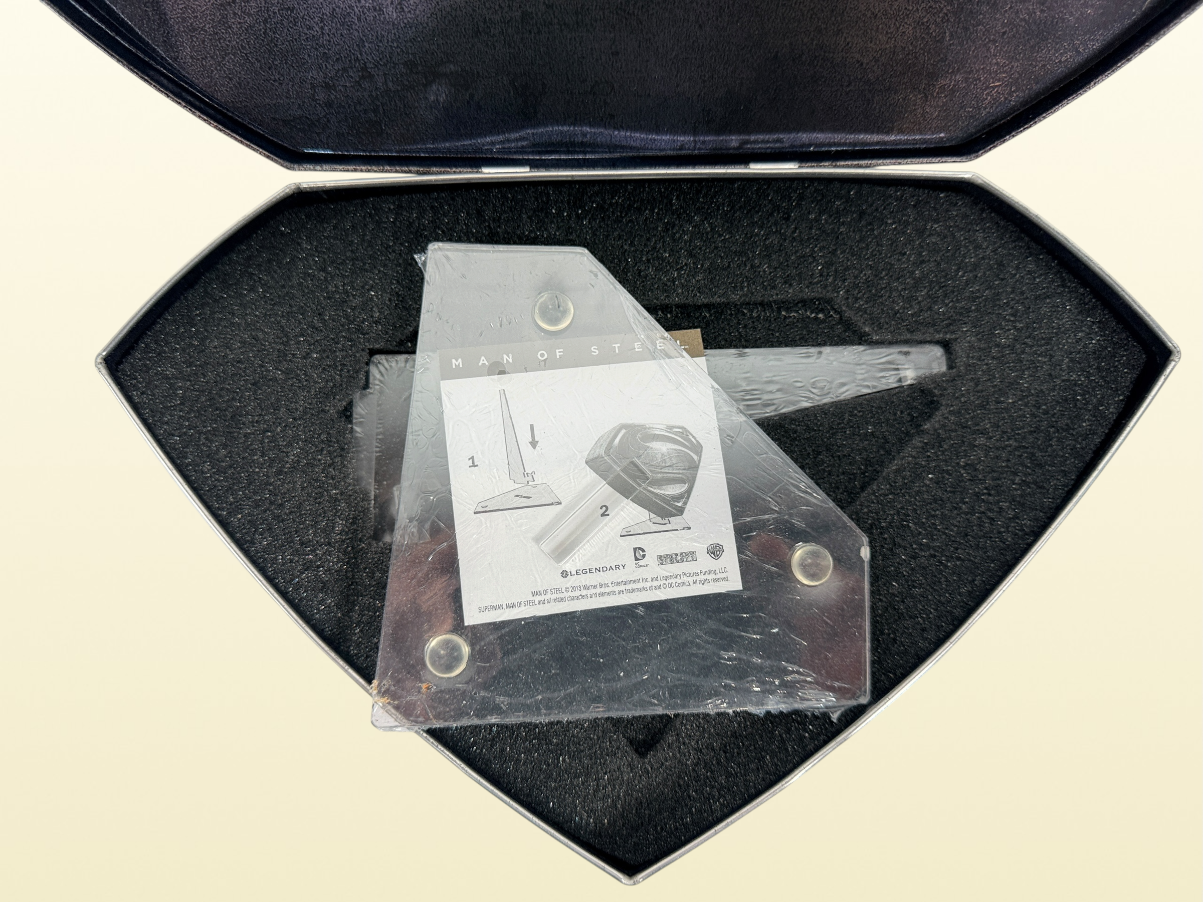Limited numbered Man of Steel Collector's Edition #08205/10000 with embossed metal Superman case, acrylic display stand, Blu-ray 3D, Blu-ray, DVD and bonus disc.