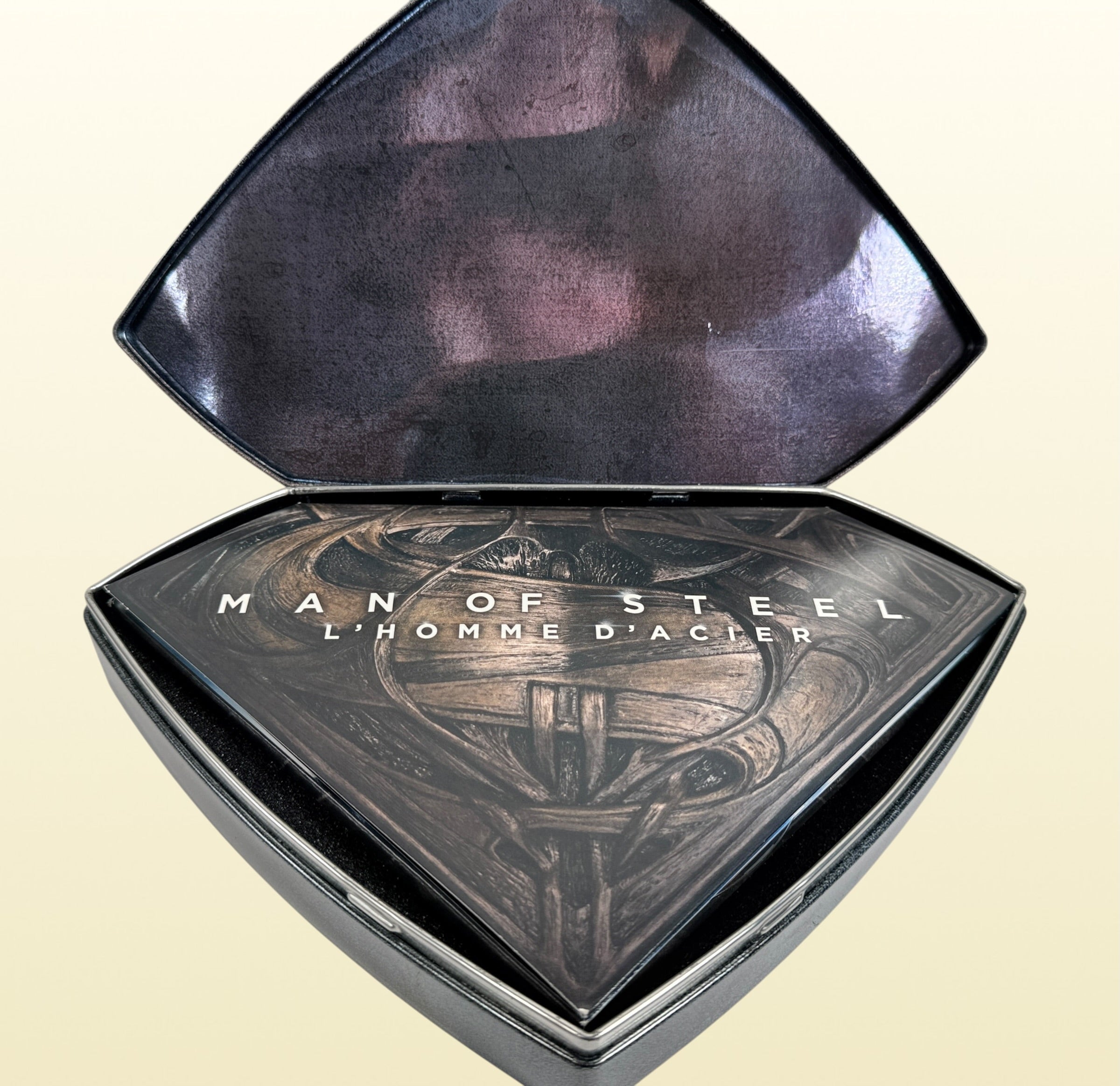 Limited numbered Man of Steel Collector's Edition #08205/10000 with embossed metal Superman case, acrylic display stand, Blu-ray 3D, Blu-ray, DVD and bonus disc.