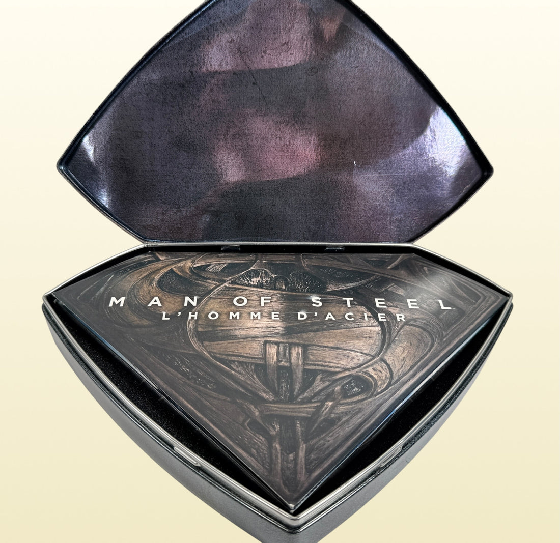 Limited numbered Man of Steel Collector's Edition #08205/10000 with embossed metal Superman case, acrylic display stand, Blu-ray 3D, Blu-ray, DVD and bonus disc.