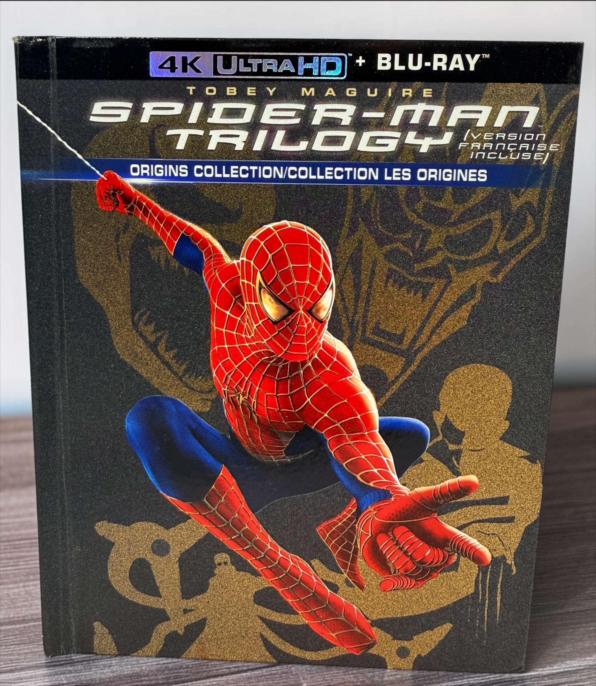 Complete Spider-Man Trilogy Origins Collection Digibook with 4K Ultra HD and Blu-ray discs plus bonus disc. Premium Tobey Maguire collector’s edition.