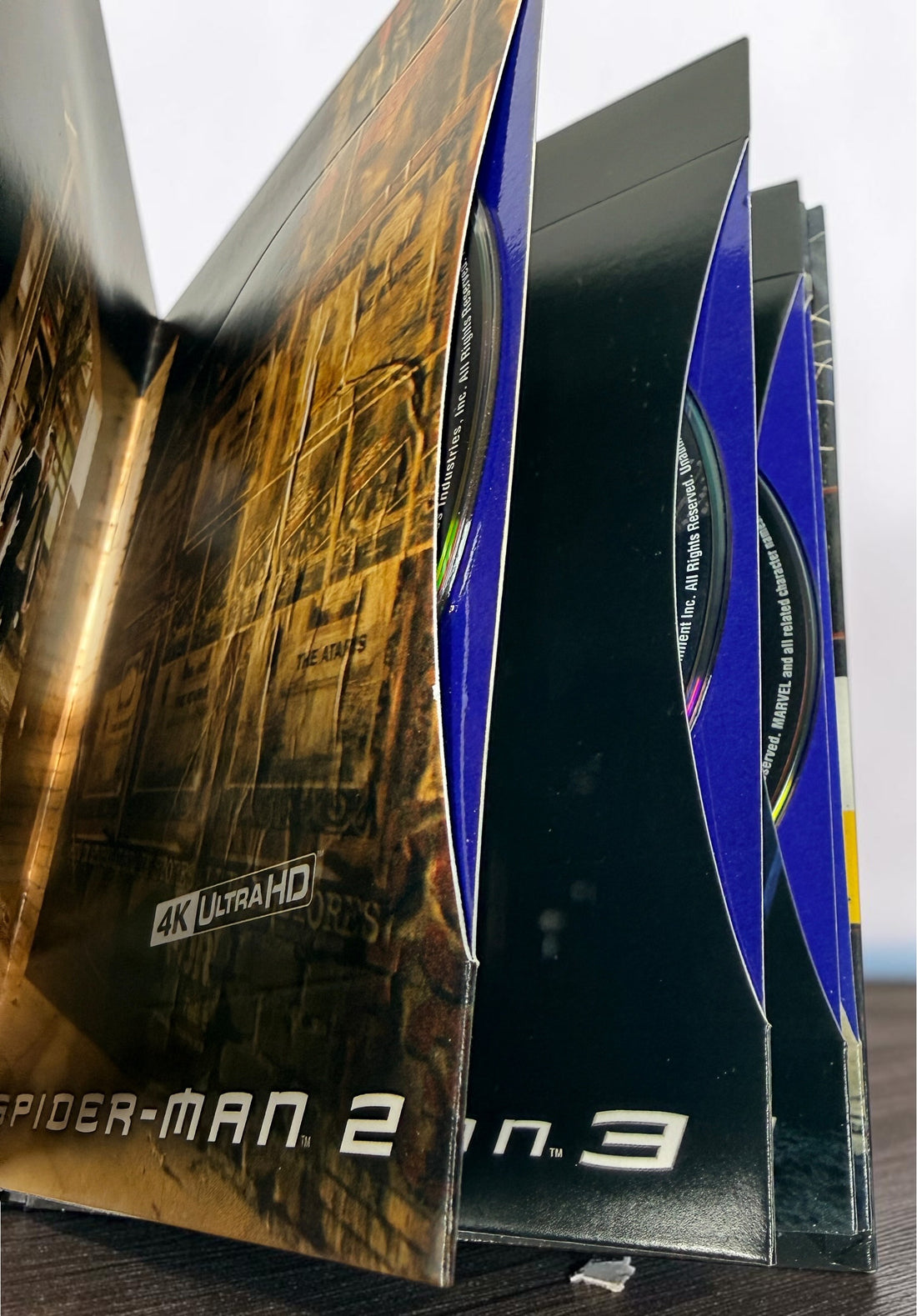 Complete Spider-Man Trilogy Origins Collection Digibook with 4K Ultra HD and Blu-ray discs plus bonus disc. Premium Tobey Maguire collector’s edition.