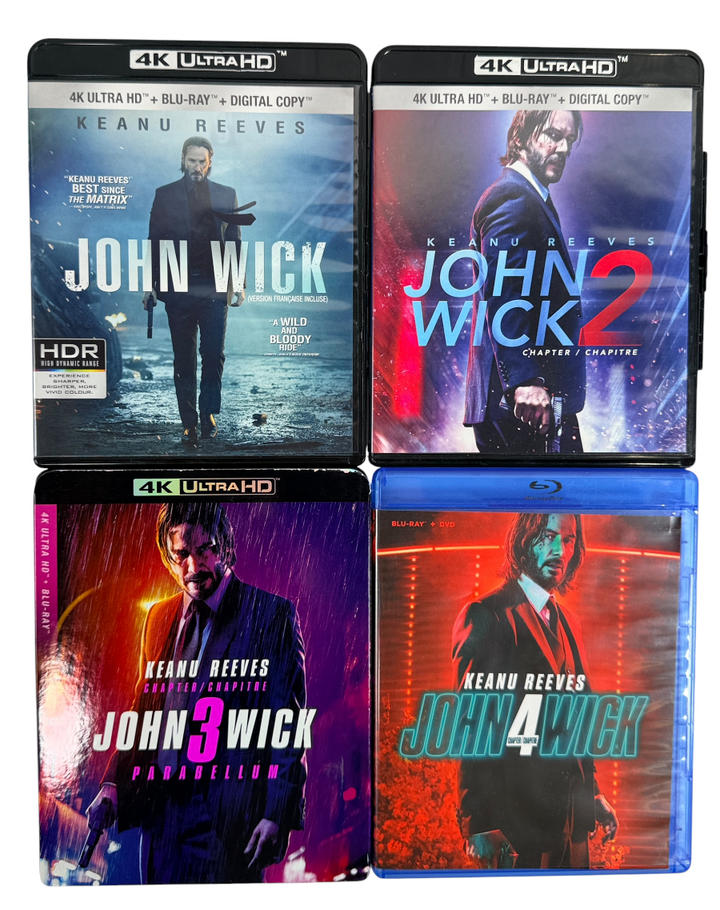 Complete John Wick 1–4 movie collection starring Keanu Reeves. Includes Chapters 1–3 on 4K UHD + Blu-ray and Chapter 4 on Blu-ray + DVD. Excellent pre-owned condition.