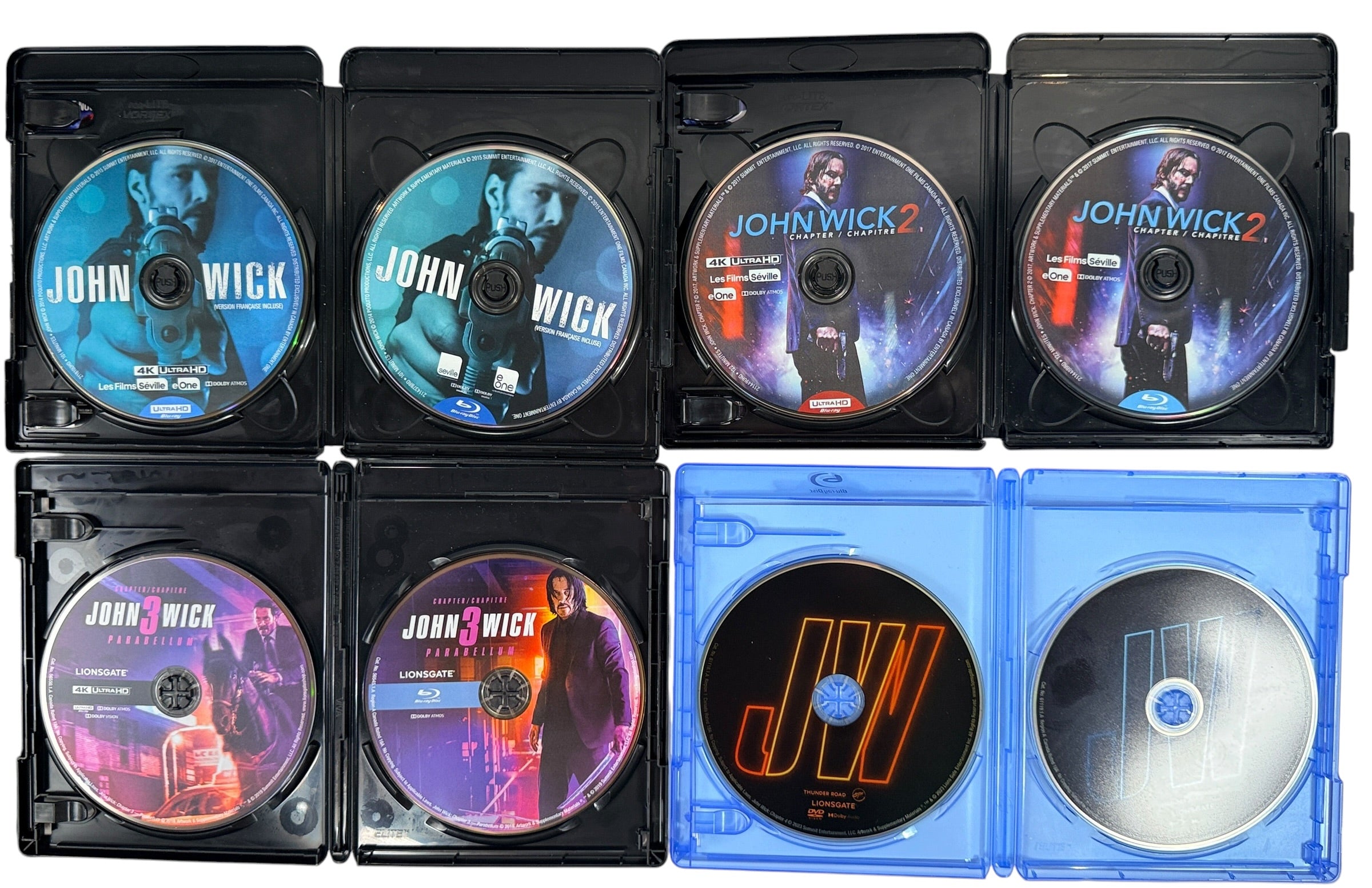 Complete John Wick 1–4 movie collection starring Keanu Reeves. Includes Chapters 1–3 on 4K UHD + Blu-ray and Chapter 4 on Blu-ray + DVD. Excellent pre-owned condition.