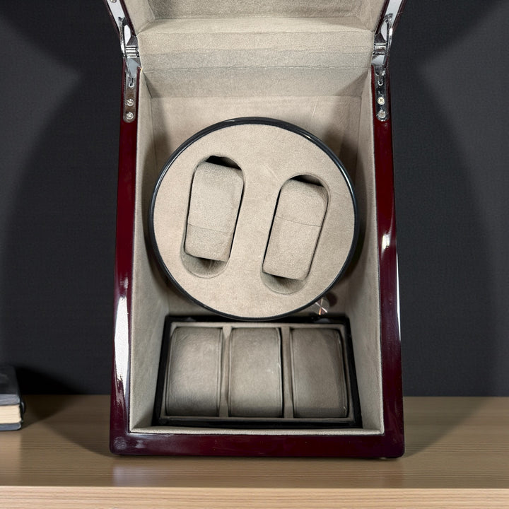 Working dual automatic watch winder in piano black lacquer with storage, display lid, and AC adaptor. Clean, functional, and perfect for protecting your watches…

