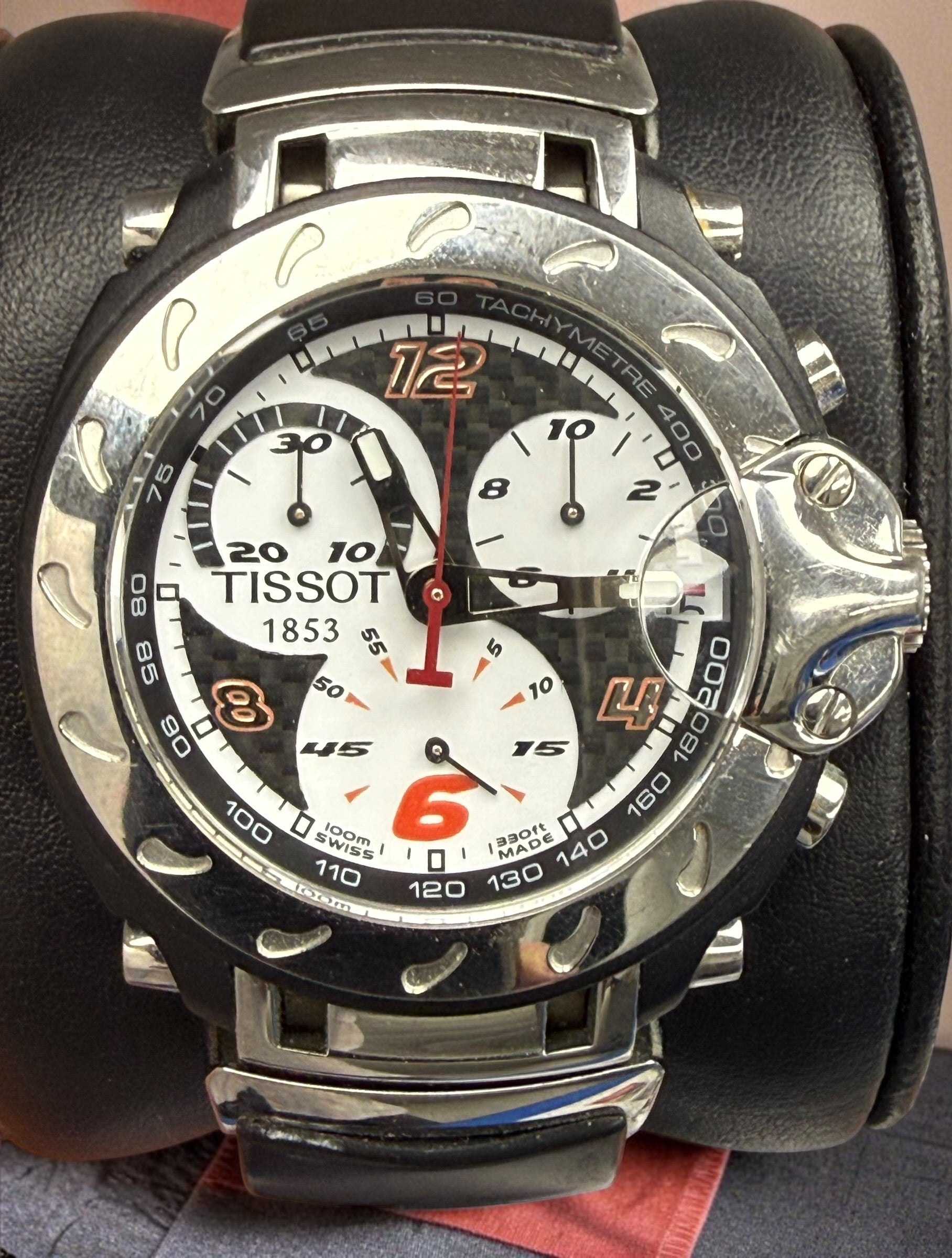 Rare Tissot T-Race MotoGP 2007 Limited Edition chronograph No. 1700/7002 with original helmet case, manuals, warranty card, and circuit medallions. Complete collector set.